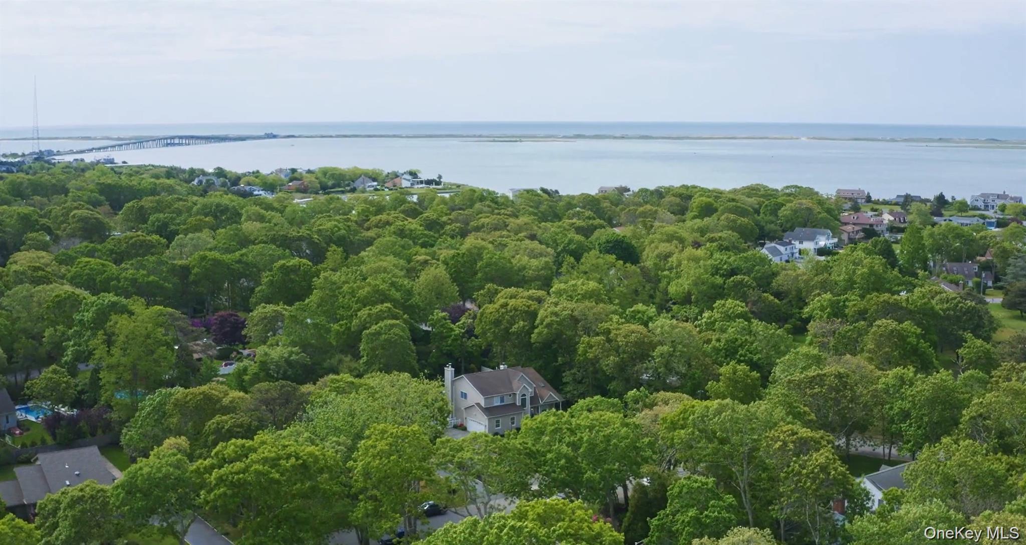 5 Mill Race Road Hampton Bays, NY 11946 - Photo 33 of 34 an aerial view of a city and green space