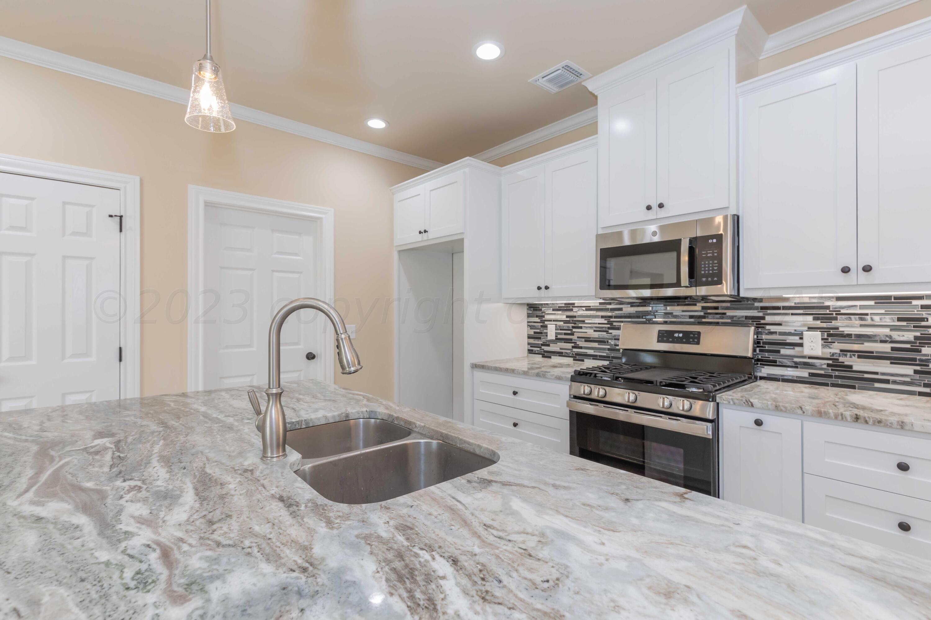 6104 Bay Ridge Amarillo, TX 79119 - Photo 28 of 48 KITCHEN VIEW 3