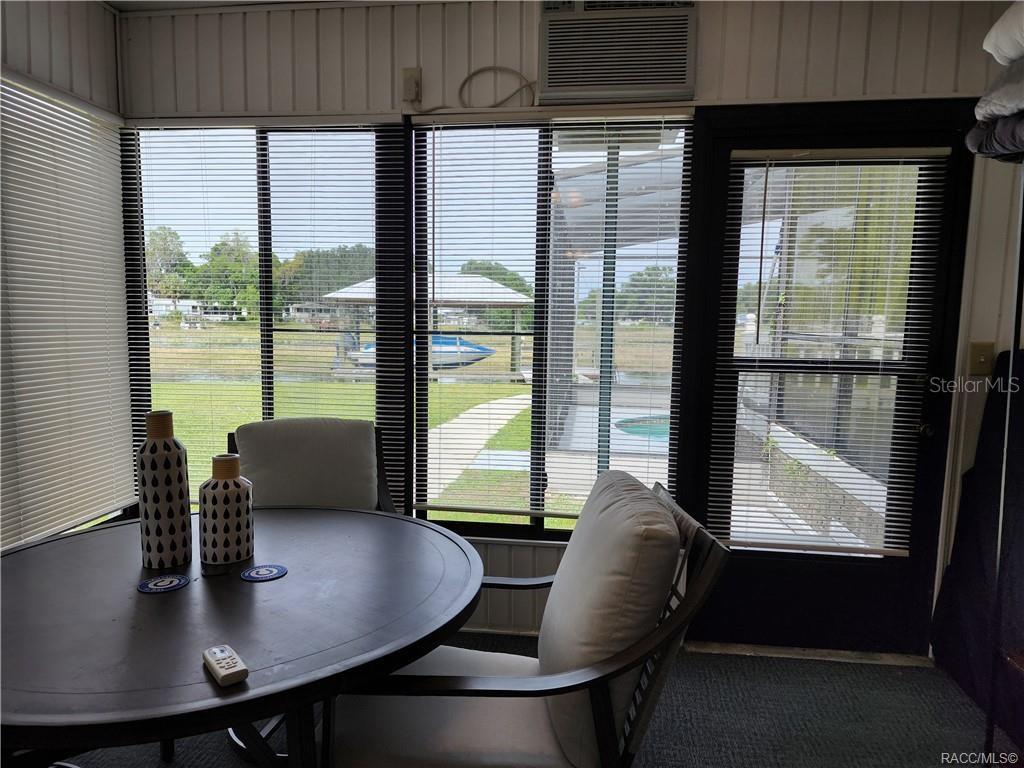 4010 East Dandy Loop Hernando, FL 34442 - Photo 16 of 30 a view of a dining room with furniture and window