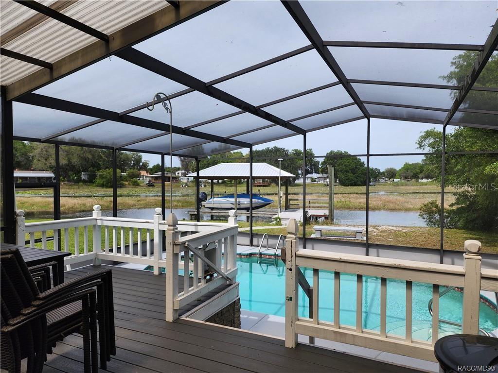 4010 East Dandy Loop Hernando, FL 34442 - Photo 2 of 30 a view of a chairs and table in the patio