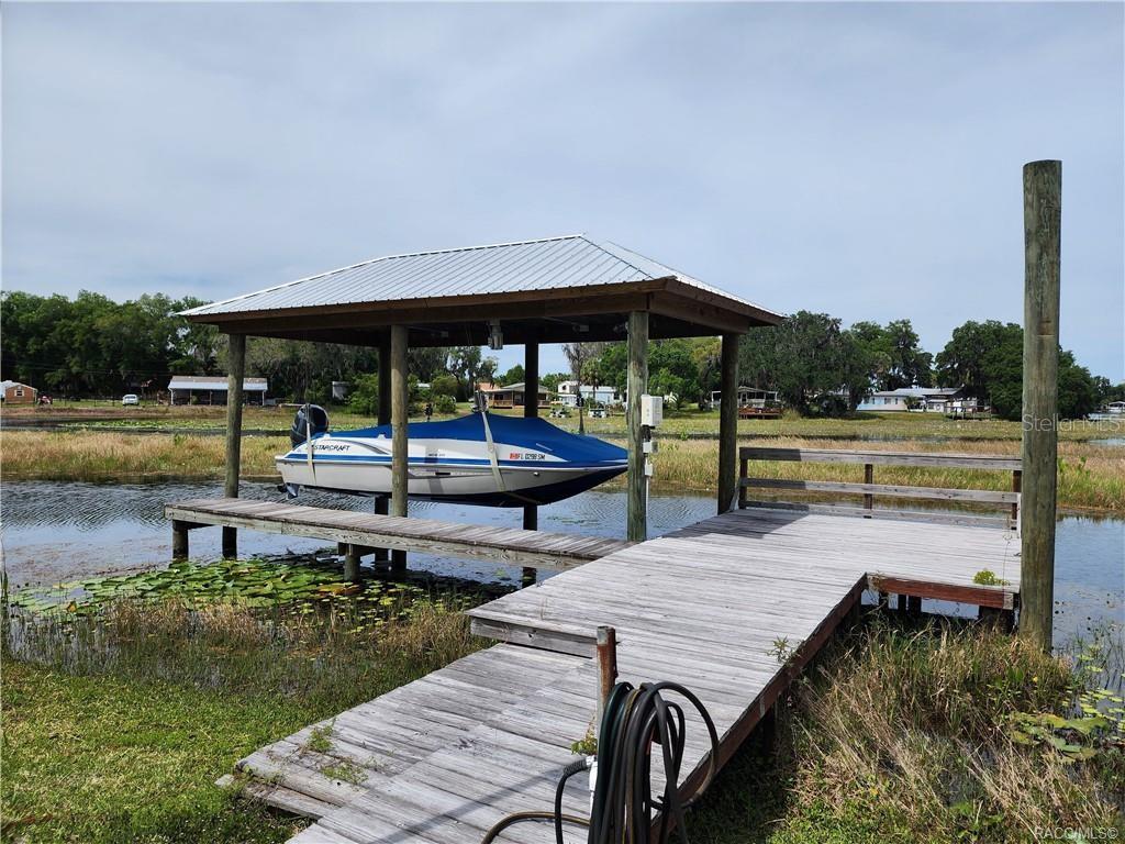4010 East Dandy Loop Hernando, FL 34442 - Photo 28 of 30 a view of a swimming pool with a patio
