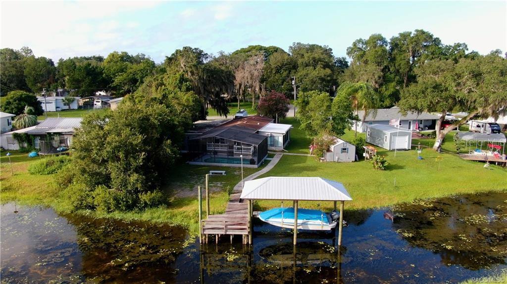 4010 East Dandy Loop Hernando, FL 34442 - Photo 30 of 30 a view of a swimming pool with sitting area