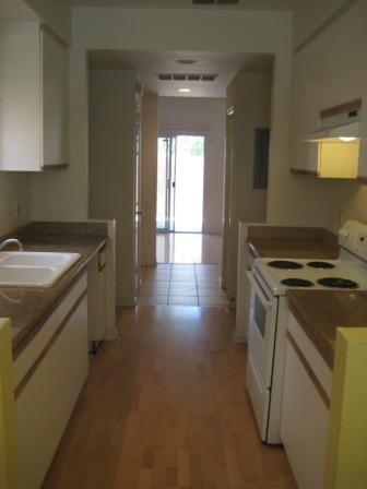 1486 Adeline Street Oakland, CA 94607 - Photo 10 of 23 View of kitchen from breakfast area looking toward dining area.