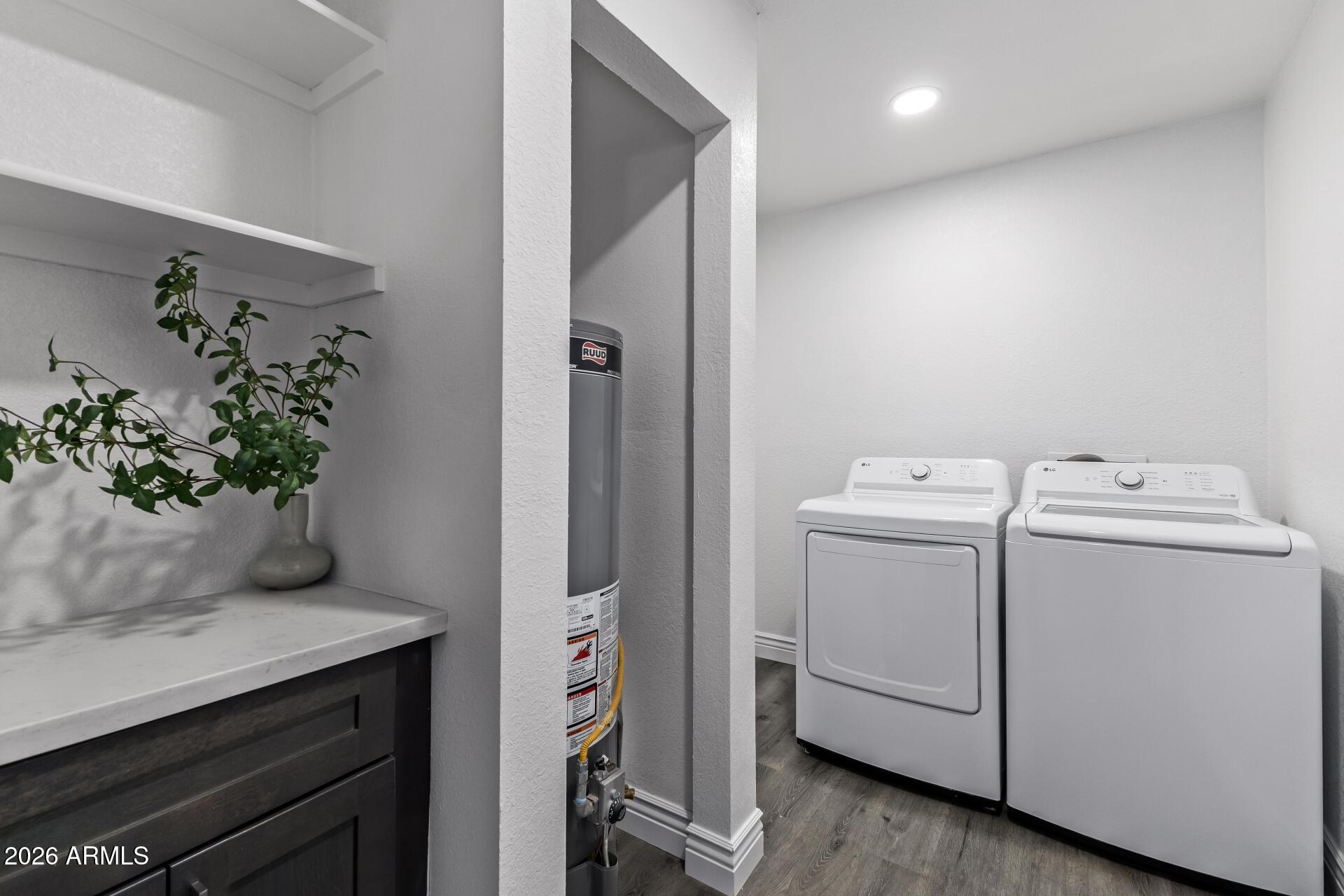 424 East Fillmore Street Tempe, AZ 85288 - Photo 13 of 20 a view of storage and utility room with washer and dryer