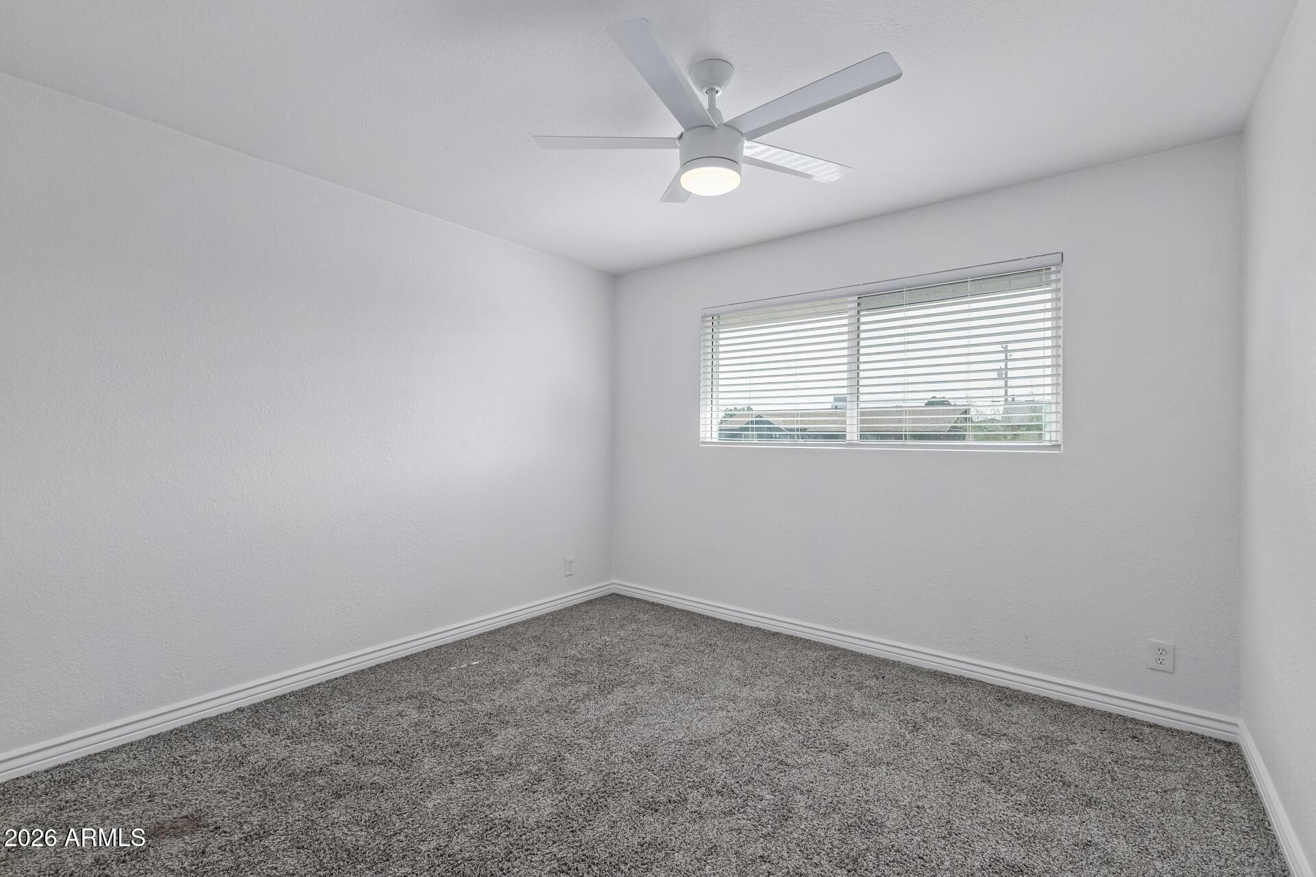 424 East Fillmore Street Tempe, AZ 85288 - Photo 16 of 20 an empty room with a window