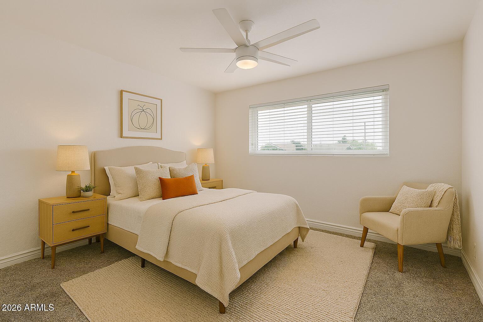 424 East Fillmore Street Tempe, AZ 85288 - Photo 5 of 20 a bedroom with a bed and a couch