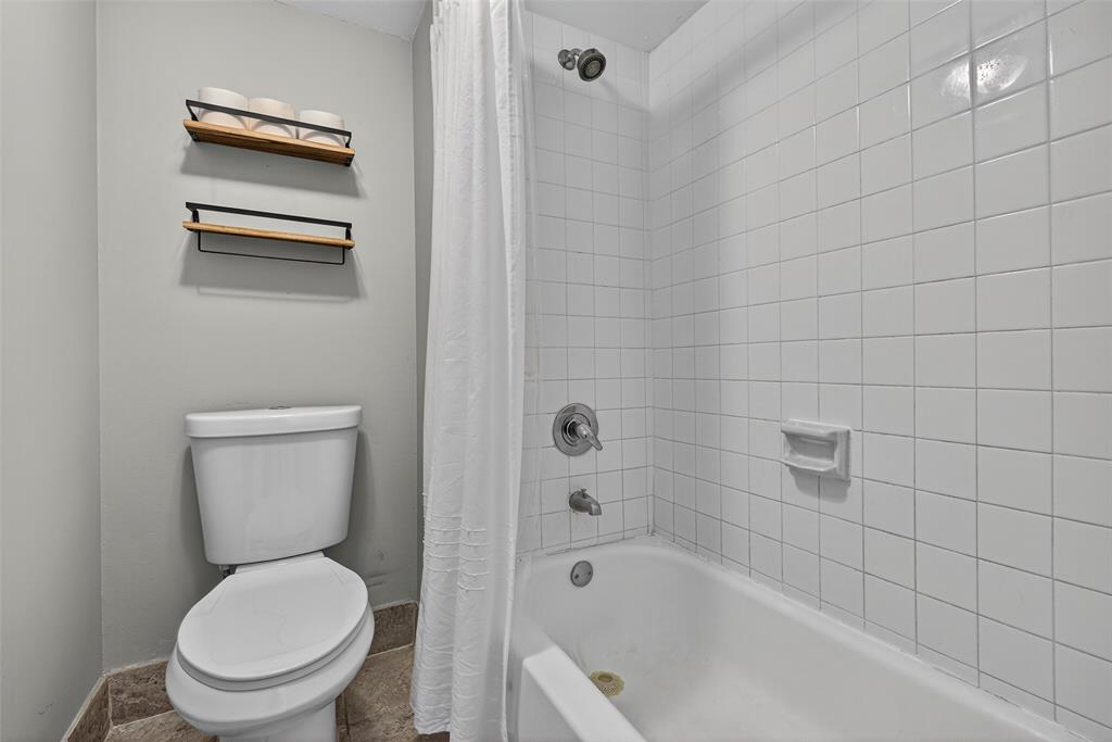 412 Lakeview Drive, Unit 202 Weston, FL 33326 - Photo 25 of 34 a white toilet sitting next to a bath tub