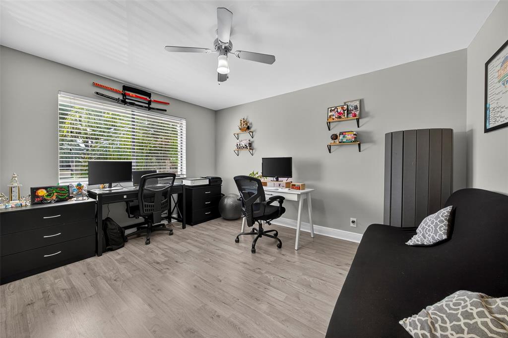 412 Lakeview Drive, Unit 202 Weston, FL 33326 - Photo 26 of 34 a view of a workspace with furniture and a window