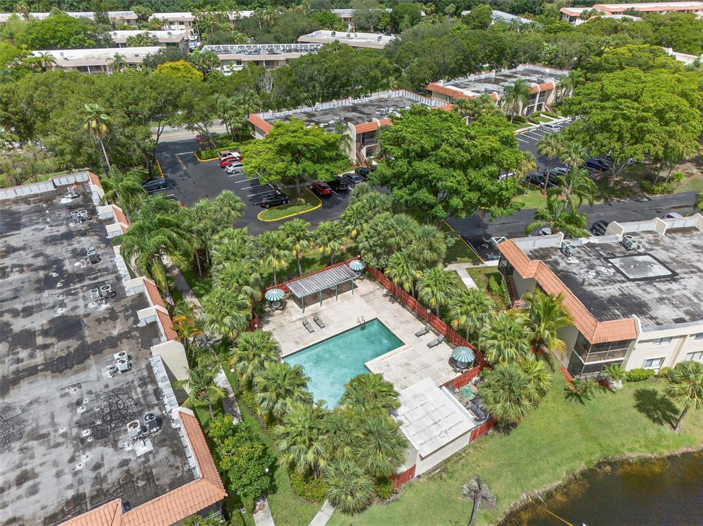 412 Lakeview Drive, Unit 202 Weston, FL 33326 - Photo 32 of 34 an aerial view of residential houses with outdoor space