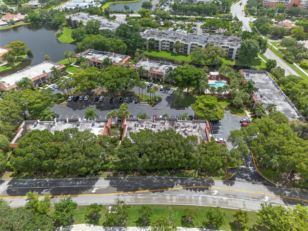 412 Lakeview Drive, Unit 202 Weston, FL 33326 - Photo 33 of 34 an aerial view of residential house with outdoor space and swimming pool