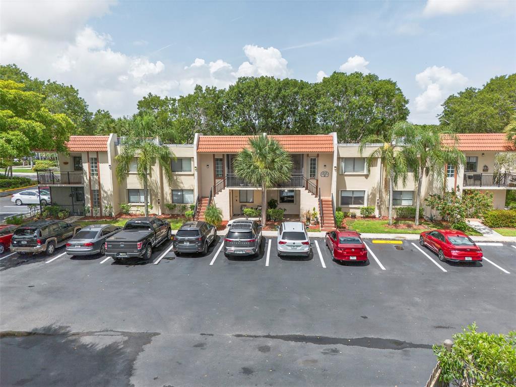 412 Lakeview Drive, Unit 202 Weston, FL 33326 - Photo 34 of 34 a view of the street with cars