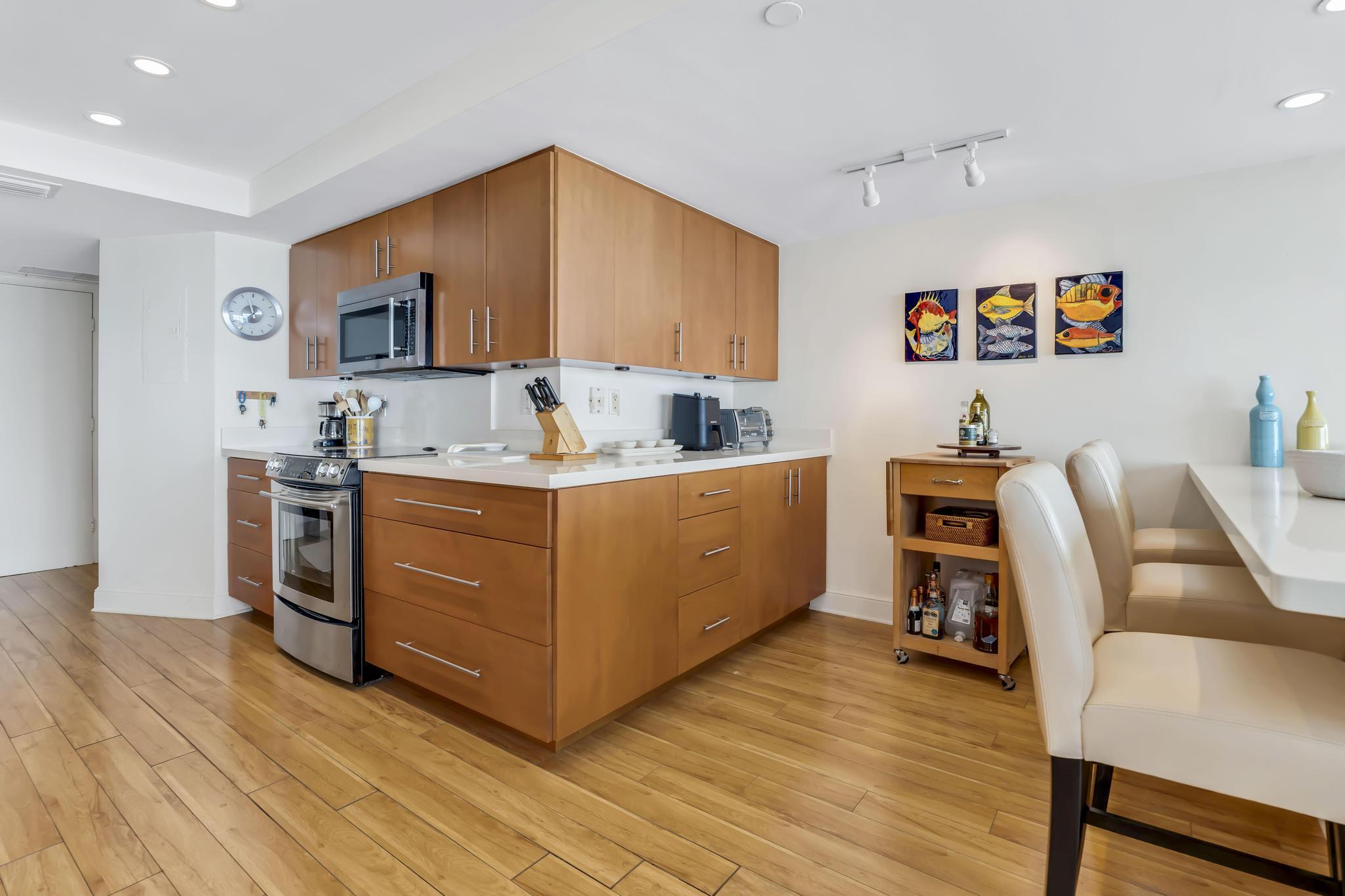4301 North Ocean Boulevard, Unit 1002 Boca Raton, FL 33431 - Photo 15 of 71 a living room with furniture and a wooden floor