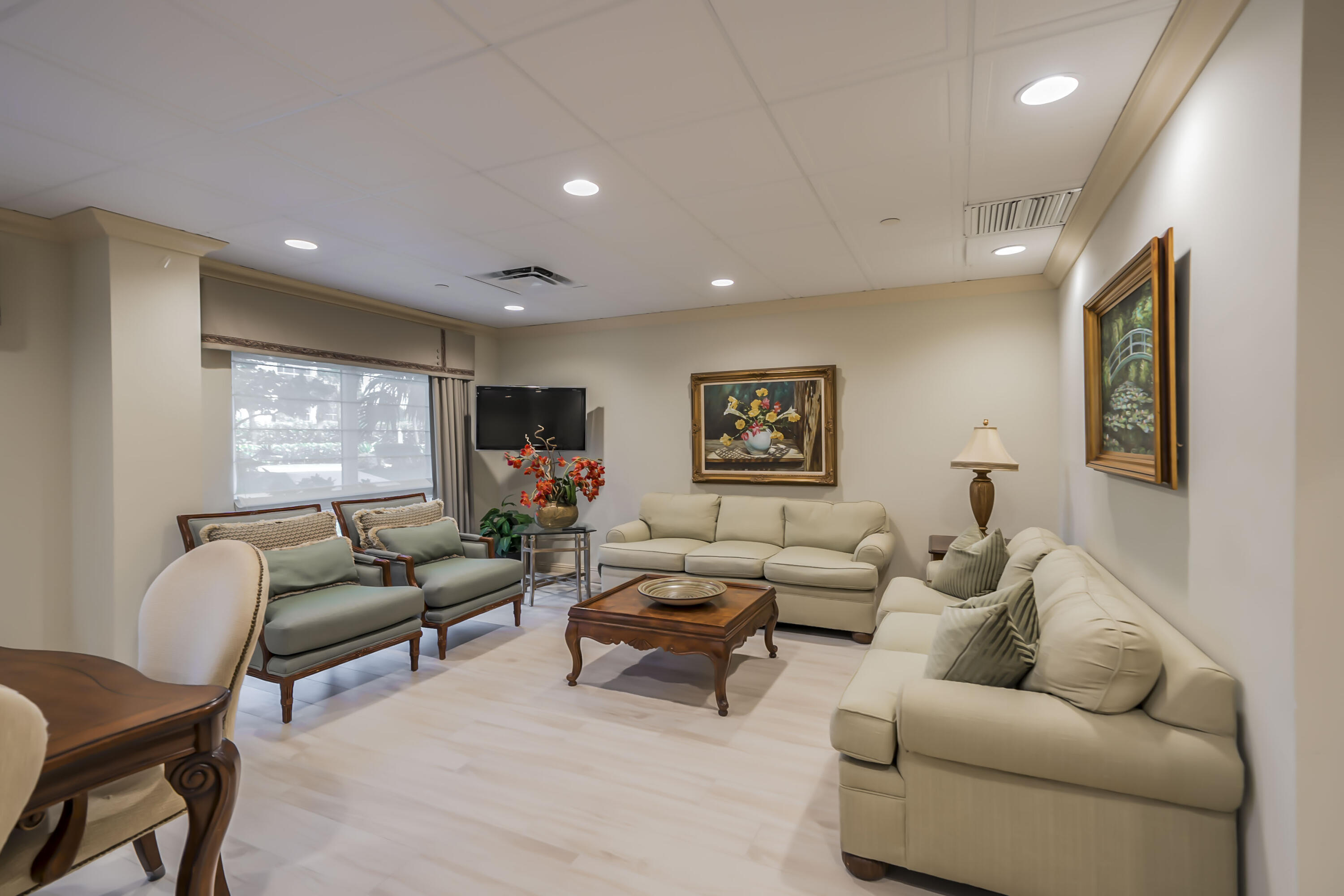 4301 North Ocean Boulevard, Unit 1002 Boca Raton, FL 33431 - Photo 61 of 71 a living room with furniture and a large window