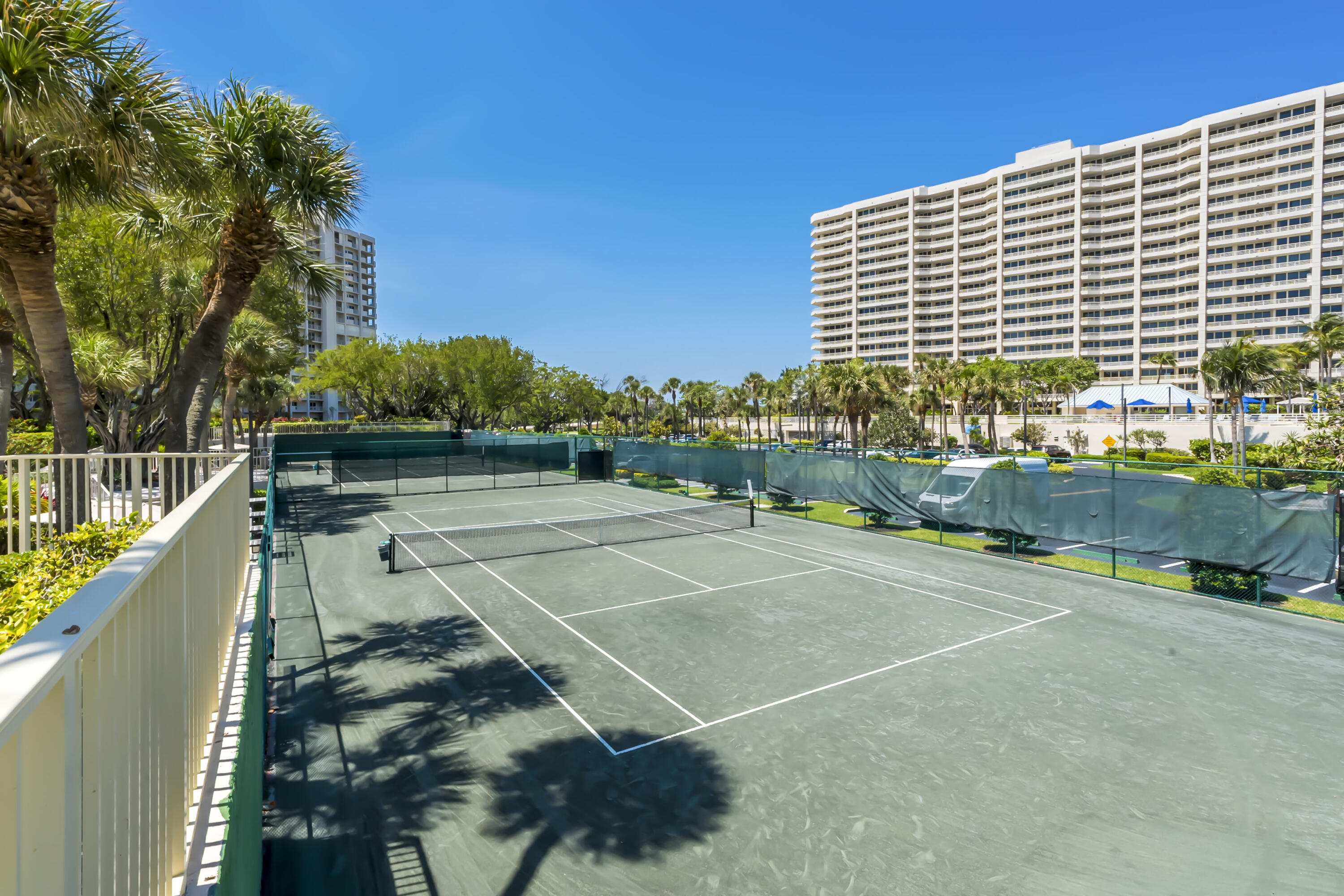 4301 North Ocean Boulevard, Unit 1002 Boca Raton, FL 33431 - Photo 64 of 71 a view of a tennis court
