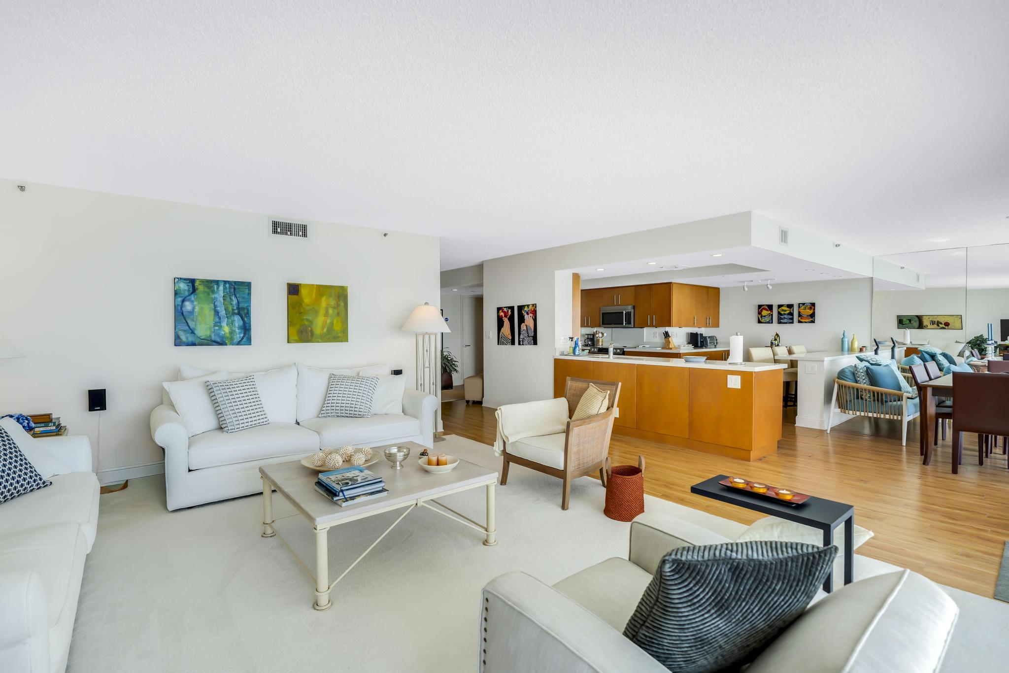 4301 North Ocean Boulevard, Unit 1002 Boca Raton, FL 33431 - Photo 7 of 71 a living room with furniture and wooden floor