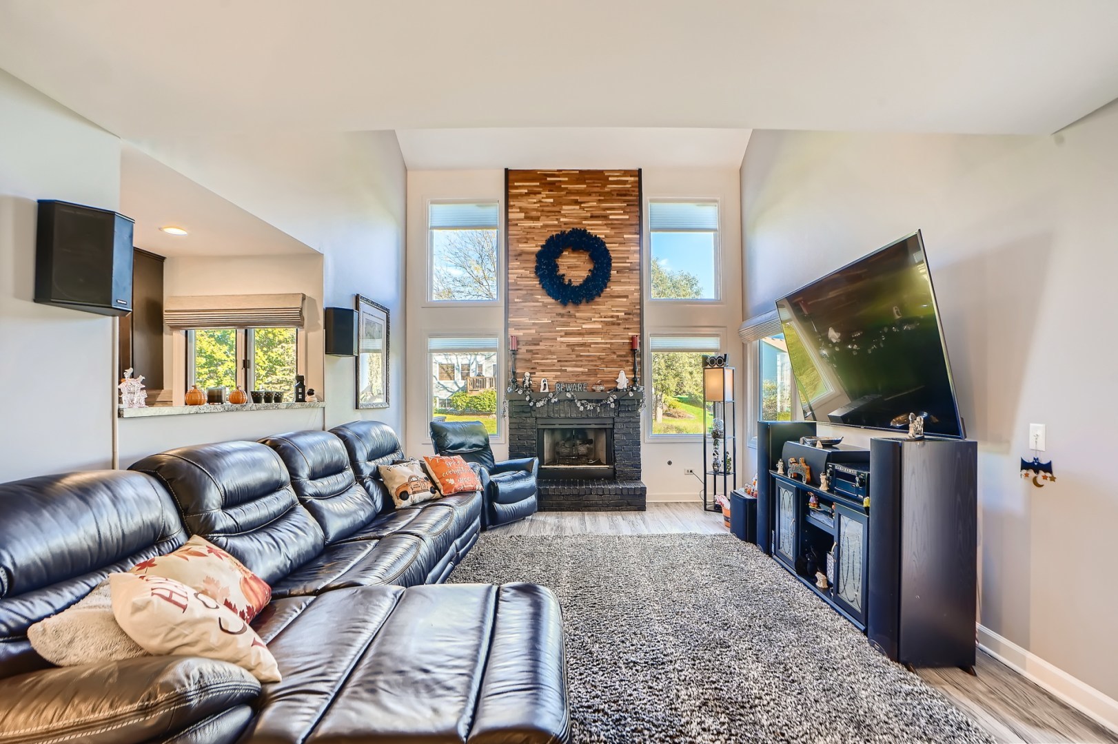 1083 Sumner Circle Gurnee, IL 60031 - Photo 15 of 27 a living room with fireplace furniture and a flat screen tv
