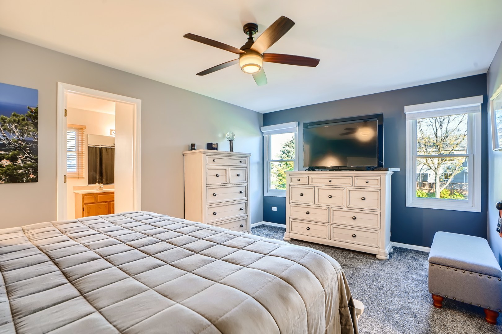 1083 Sumner Circle Gurnee, IL 60031 - Photo 19 of 27 a bedroom with a bed and a flat screen tv