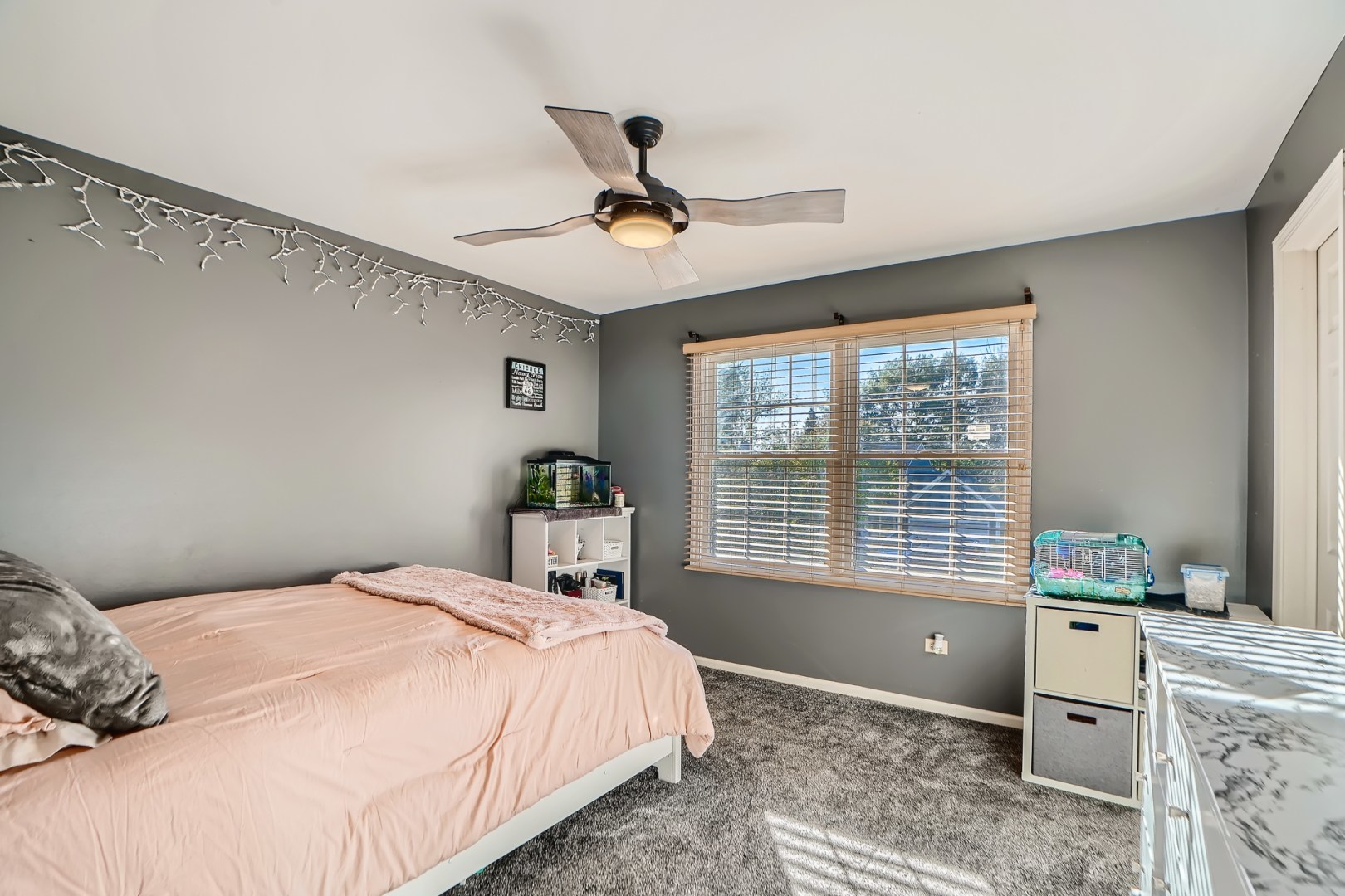 1083 Sumner Circle Gurnee, IL 60031 - Photo 24 of 27 a bedroom with a bed and a window