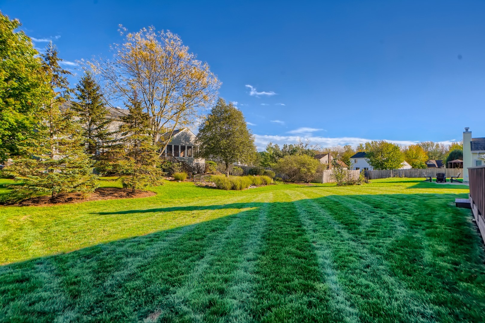 1083 Sumner Circle Gurnee, IL 60031 - Photo 4 of 27 a view of a golf course with a lake