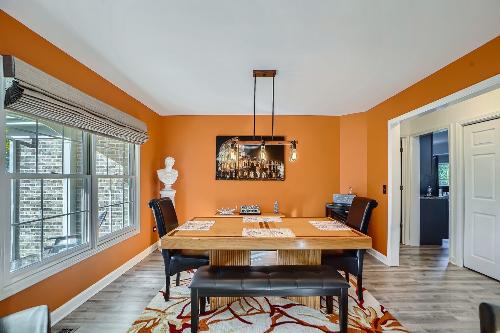 1083 Sumner Circle Gurnee, IL 60031 - Photo 9 of 27 a view of a dining room with furniture window and wooden floor