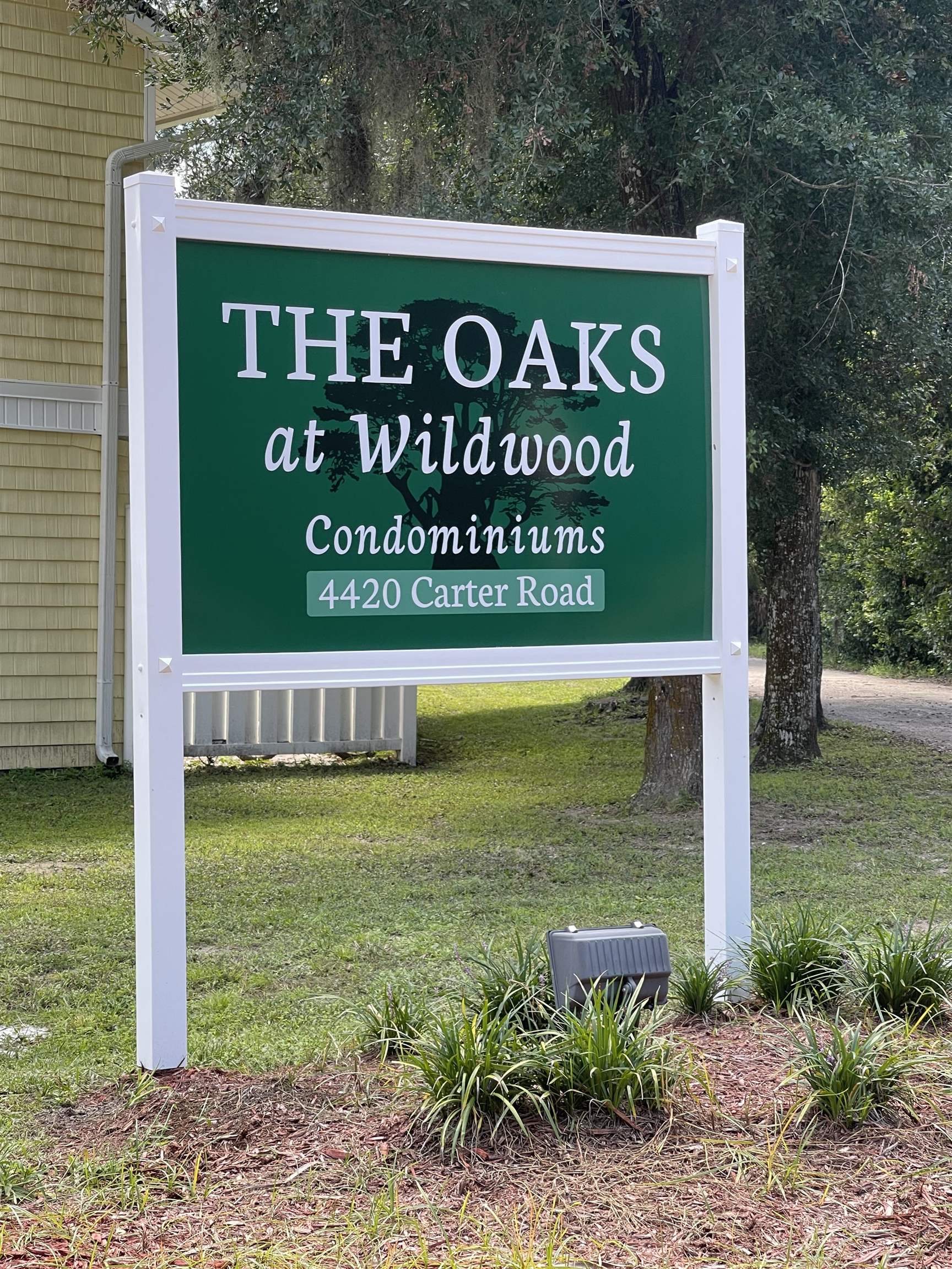 4420 Carter Road, Unit 29 St. Augustine, FL 32086 - Photo 2 of 15 a sign on the side of the road
