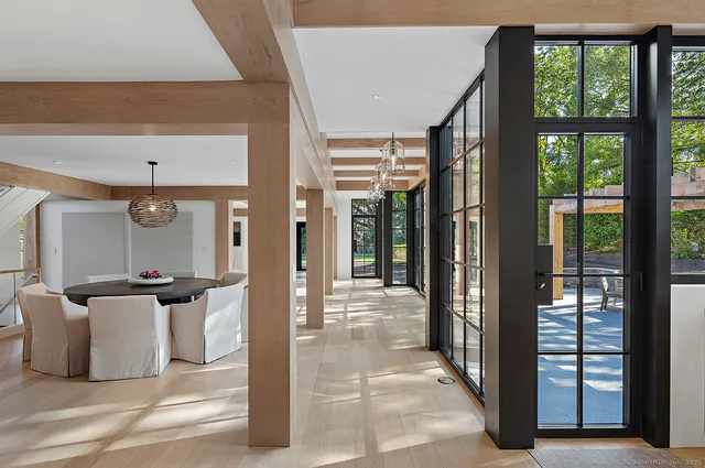 a view of a hallway with a living room