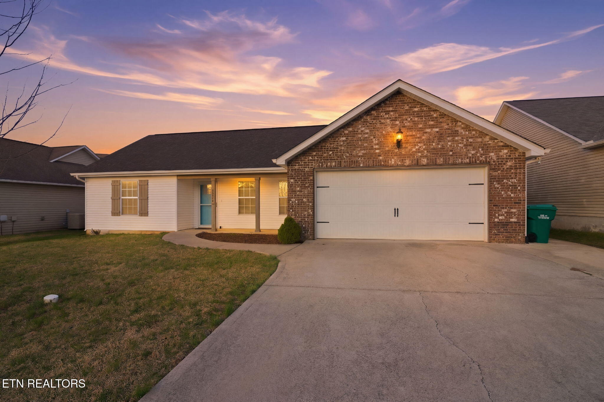 7812 Edwards Pl Boulevard Corryton, TN 37721 - Photo 2 of 33 25-web-or-mls-DZ3A8348_twilight_e79ef990