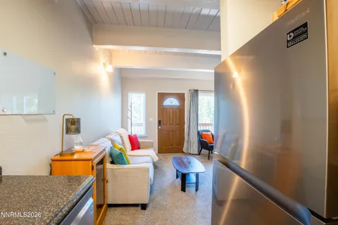 a view of a bathroom from a corridor
