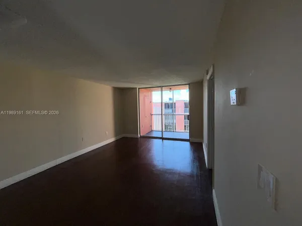 a room with furniture and a window