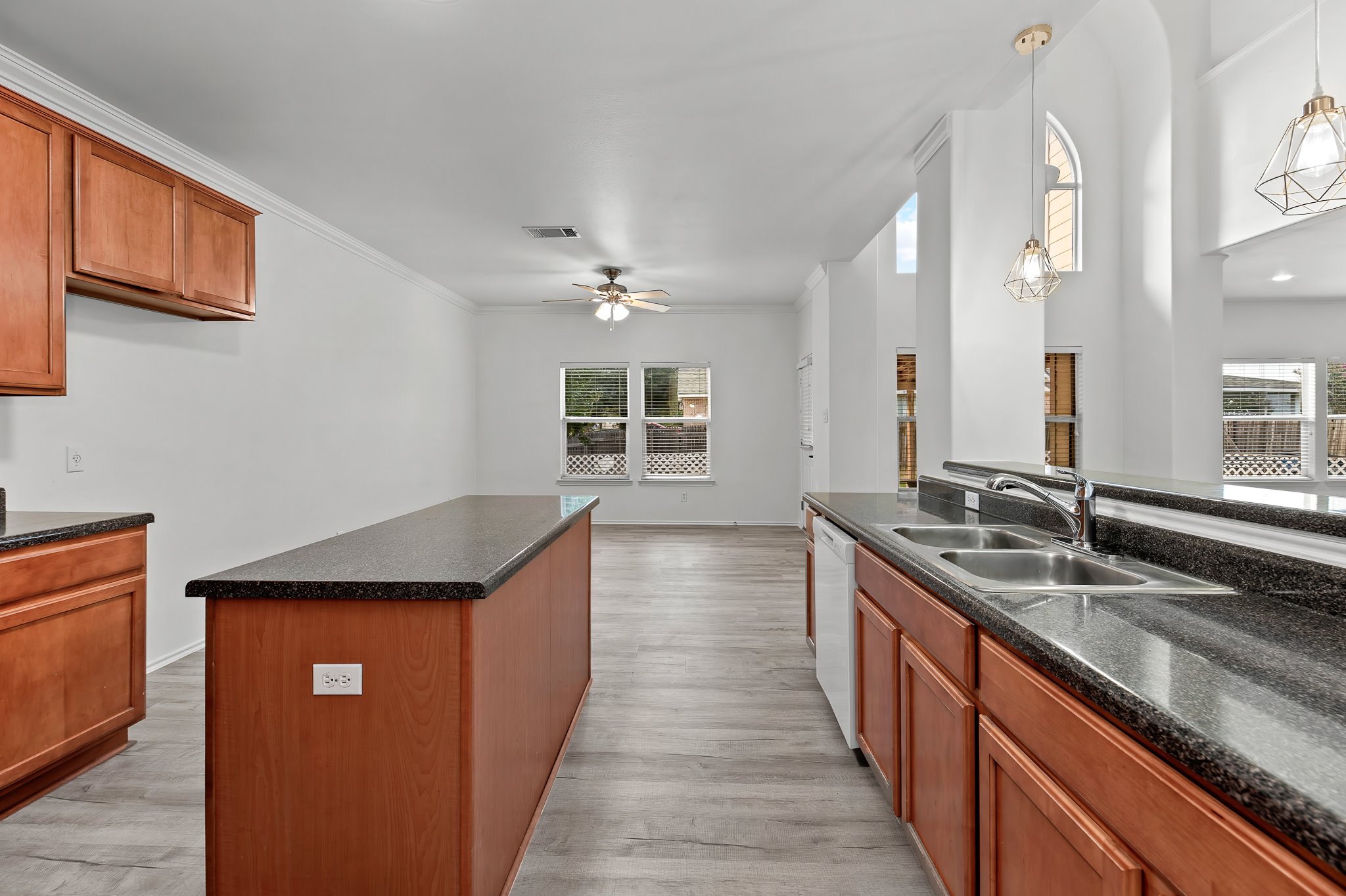 6700 Tulloch Way Austin, TX 78754 - Photo 11 of 39 a kitchen with stainless steel appliances granite countertop a sink counter space and cabinets