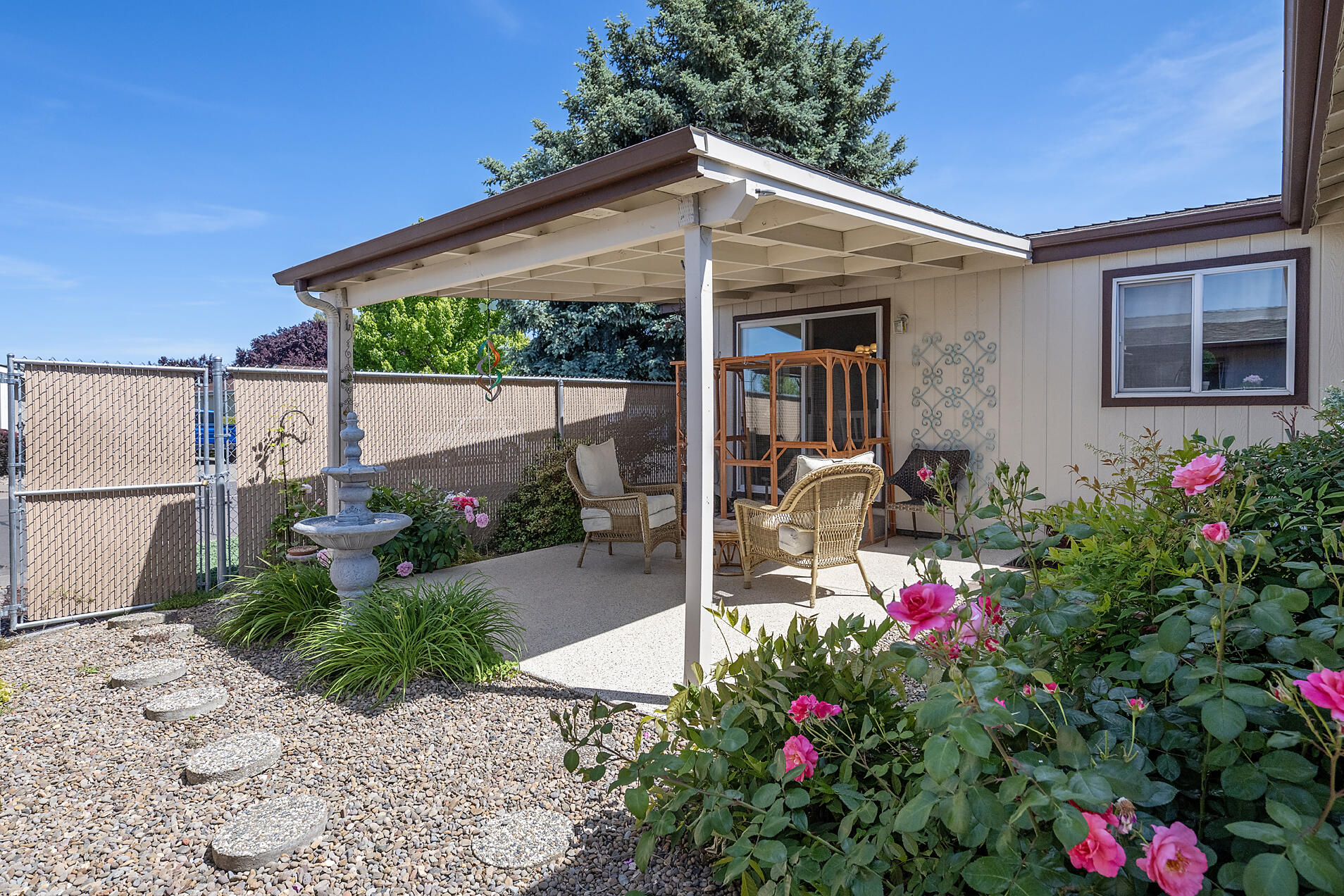 555 Freeman Road, Unit 242 Central Point, OR 97502 - Photo 16 of 26 Private low maintenance backyard w/covered area