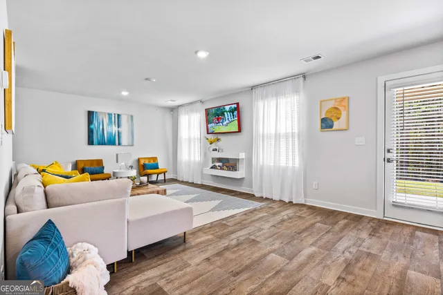 a living room with furniture and a couch