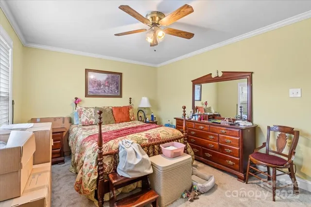 a bed room with a bed and furniture