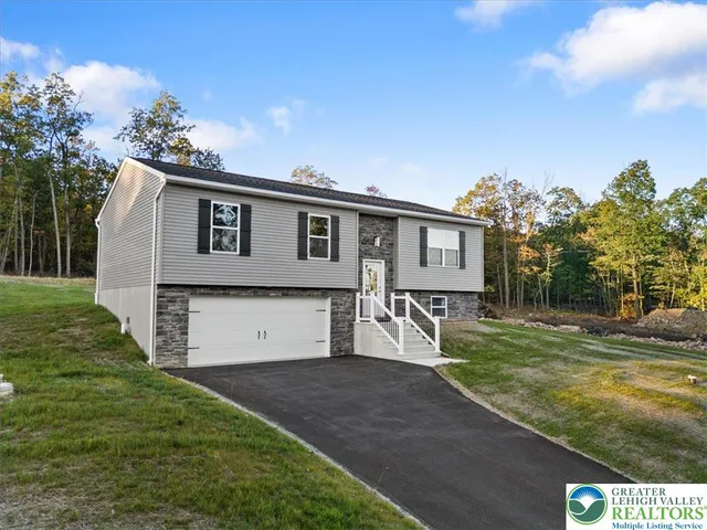a house view with a garden space