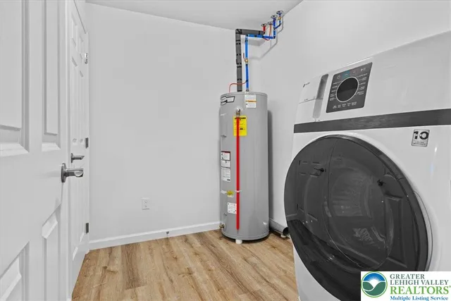 a view of entryway with wooden floor