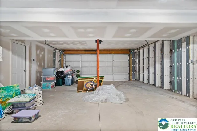 a view of a garage with a table and chairs