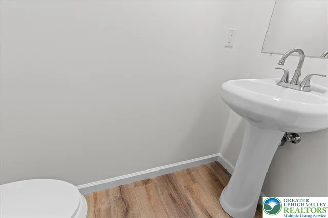 a bathroom with a sink a toilet