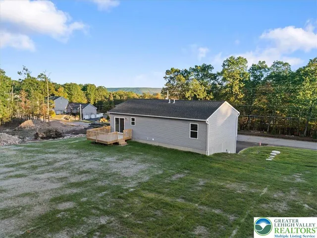 a house view with a garden space