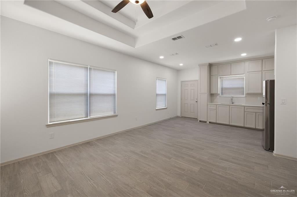 740 North Alamo Road, Unit 13 Alamo, TX 78516 - Photo 9 of 22 an empty room with closet and windows