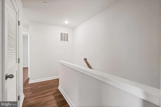 a view of small space with wooden floor