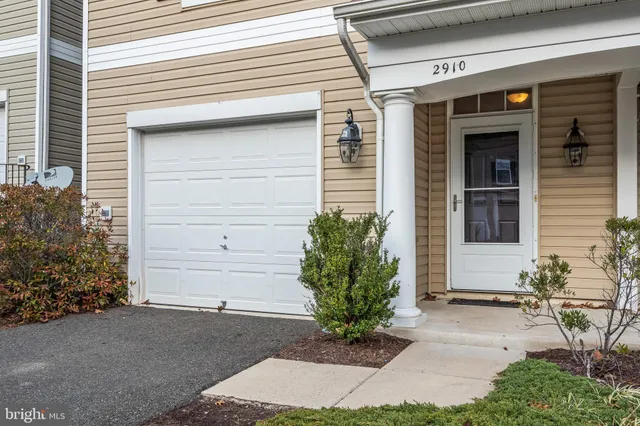 a small white house with a outdoor space