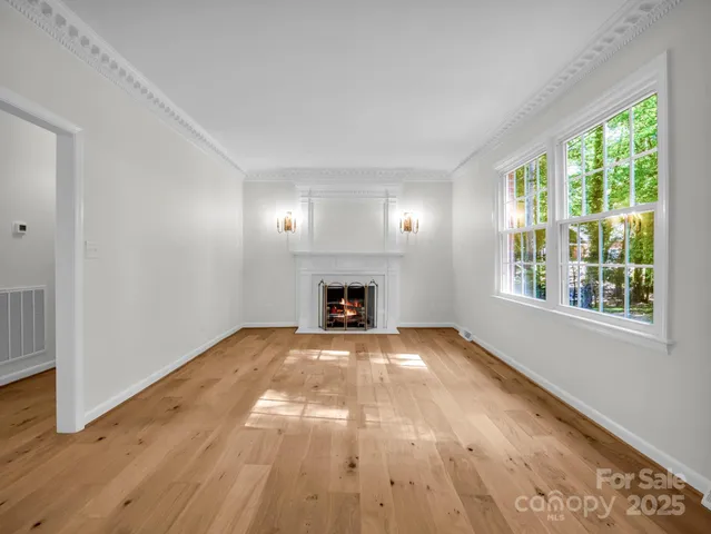 a view of an empty room and window