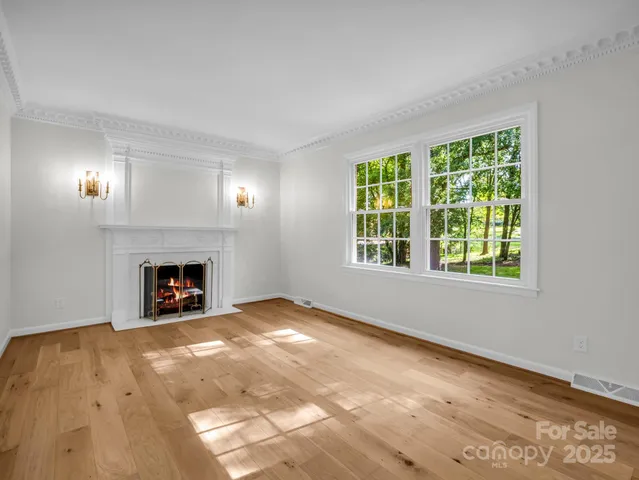 a bathroom with a sink mirror and toilet