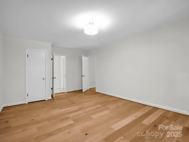 a view of a livingroom with a furniture and a ceiling fan
