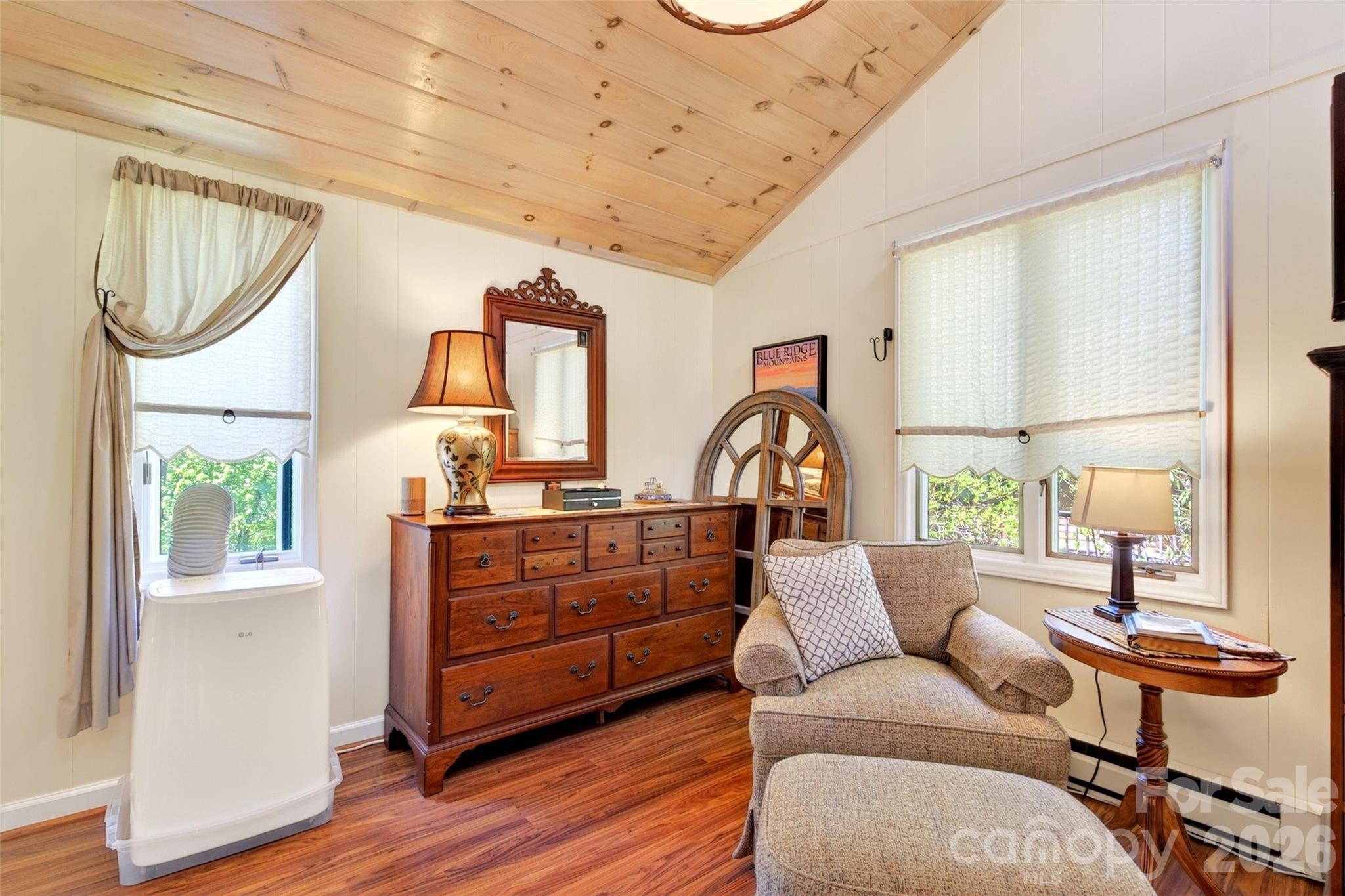 334 Harbor Lake Road Newland, NC 28657 - Photo 19 of 48 a living room with furniture a window and wooden floor