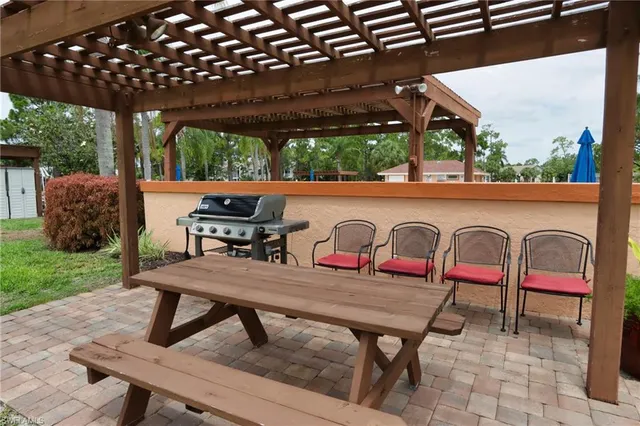 a view of a swimming pool with a sitting space