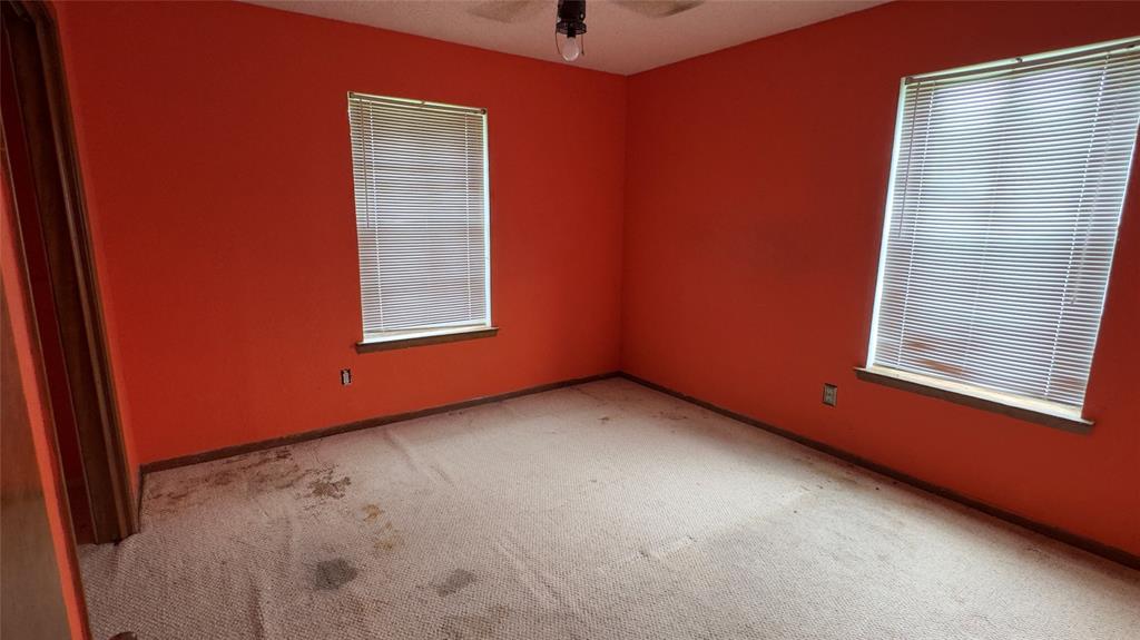415 Meadowlark Trail Springtown, TX 76082 - Photo 20 of 35 a view of an empty room and window