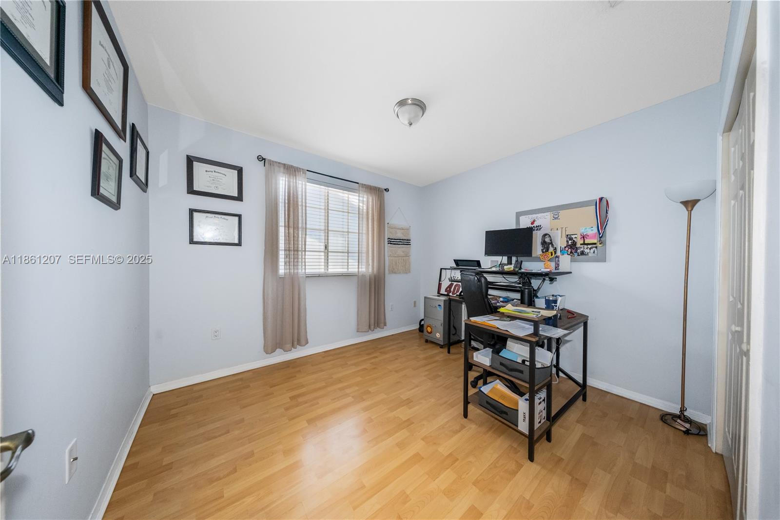 9822 Southwest 161st Place Miami, FL 33196 - Photo 36 of 47 a workspace with furniture and window