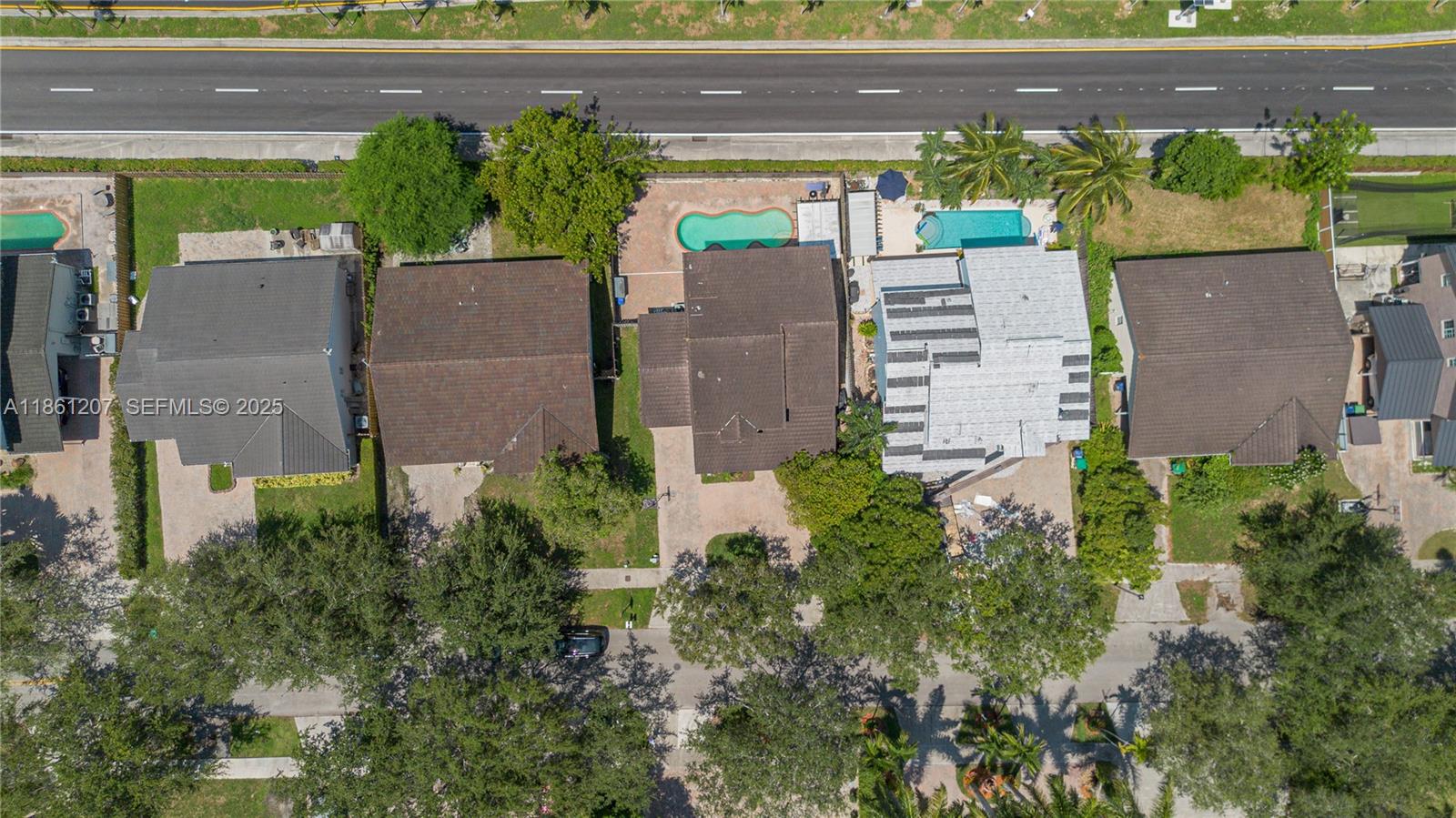 9822 Southwest 161st Place Miami, FL 33196 - Photo 45 of 47 an aerial view of a house with a yard and a garden