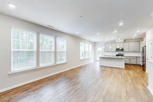 a view of kitchen with wooden floor